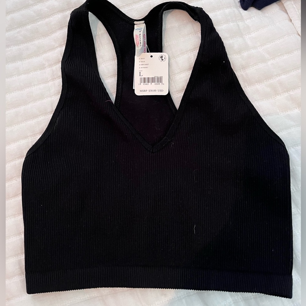 Free People movement Stylish black ribbed sports bra with racerback designSize L